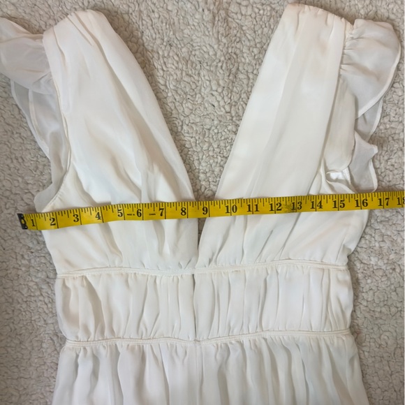 White jumpsuit with ruffles and wide legs - Picture 14 of 14